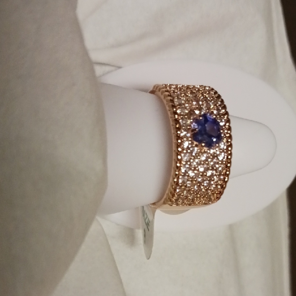 She's Beauty And Grace With Stunning Rose Gold Band.